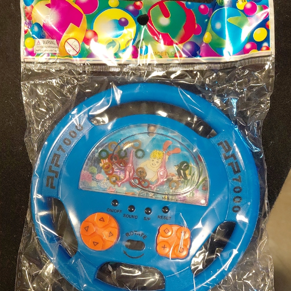 Blue and Orange Toy Steering Wheel Game
